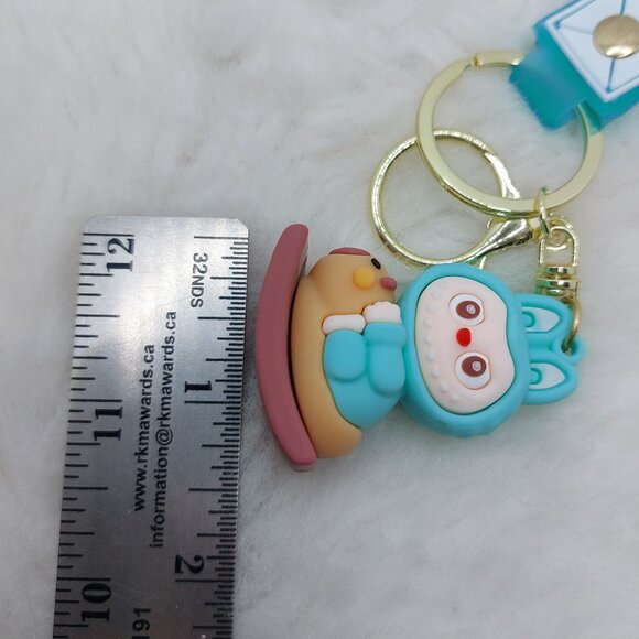2/$25 Labubu rocking horse blue keychain with strap that reads "Boom!" - Picture 5 of 6